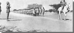 Crown Prince taking salute of Ethiopian battalion before Emperor & Wingate